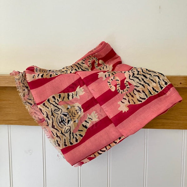 The Tigerlily Scarf Pink is made from cotton and polyester