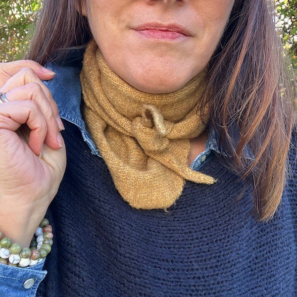 The Tilly Scarf can be worn tight around the neck or loose over the shoulders