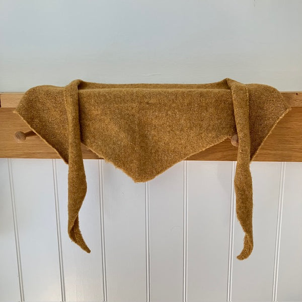 The Tilly Scarf is in a lovely mustard colourway