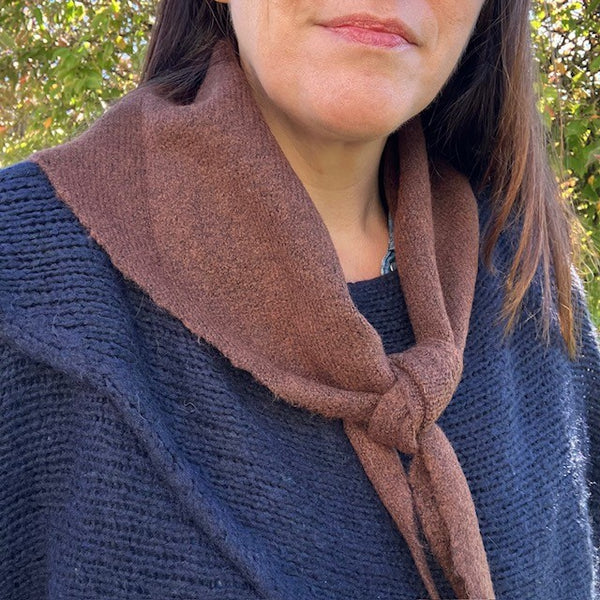 The Tilly Scarf Brown can be worn over the shoulders or as a snood