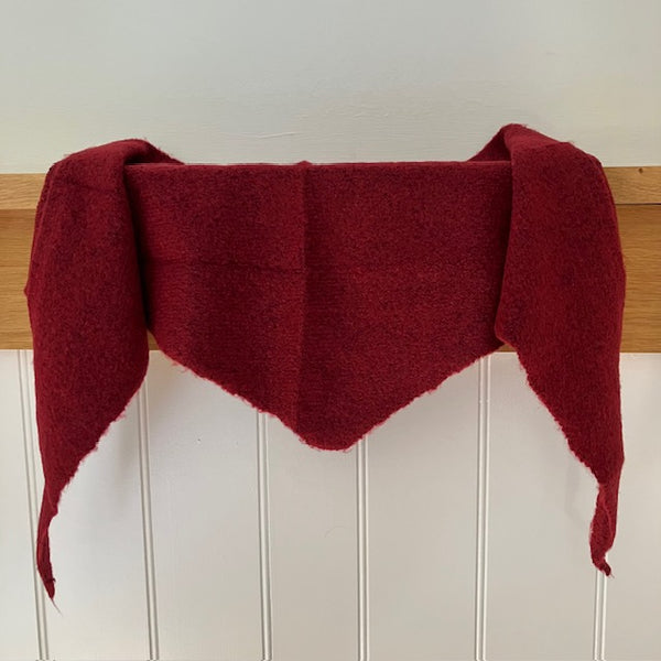 The Tilly Scarf Burgundy is in the on-trend triangle shape