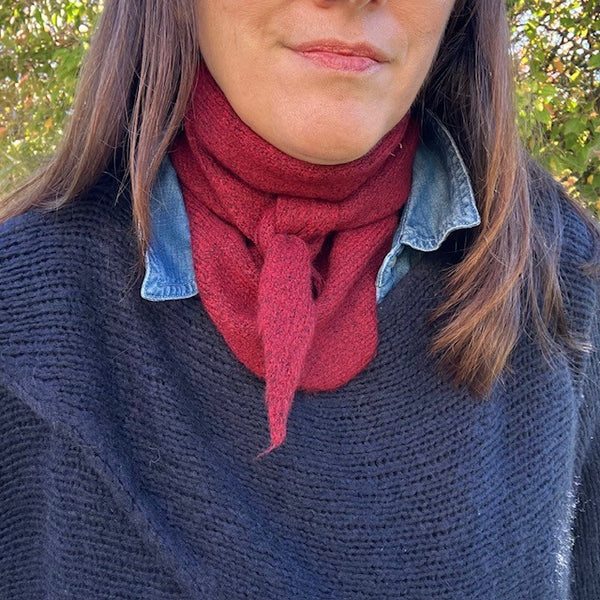The Tilly Scarf Burgundy can be worn tight around the neck or loose over the shoulders