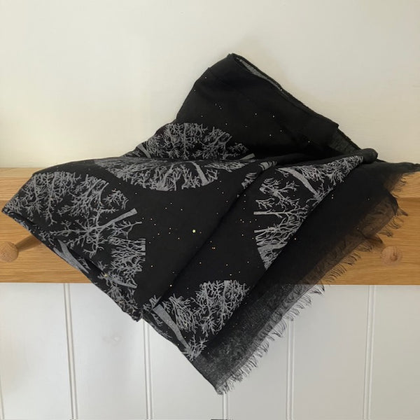 The Winter Trees Scarf Black is a stunning light weight scarf with rose gold sparkle