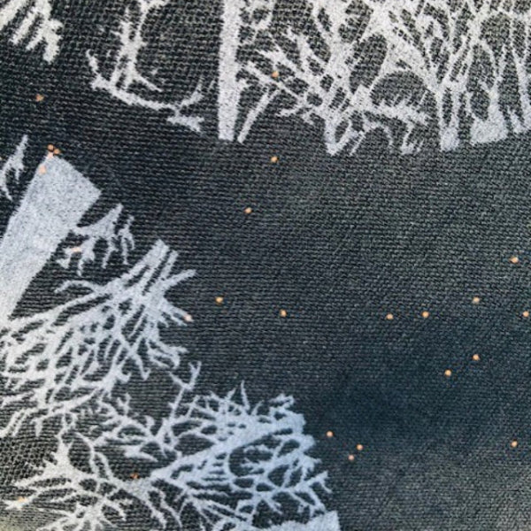 The Winter Trees Scarf Black is a stunning light weight scarf with rose gold sparkle