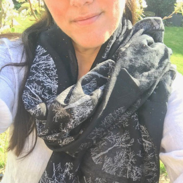 The Winter Trees Scarf Black is a stunning light weight scarf with rose gold sparkle