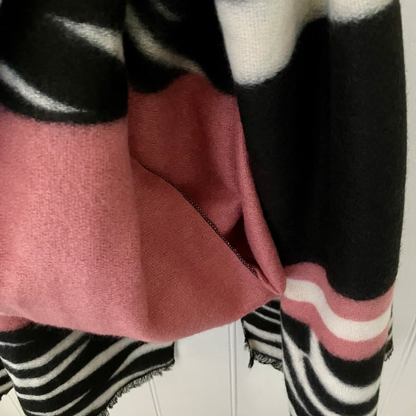 The Zara Scarf is a wonderful soft and cosy material