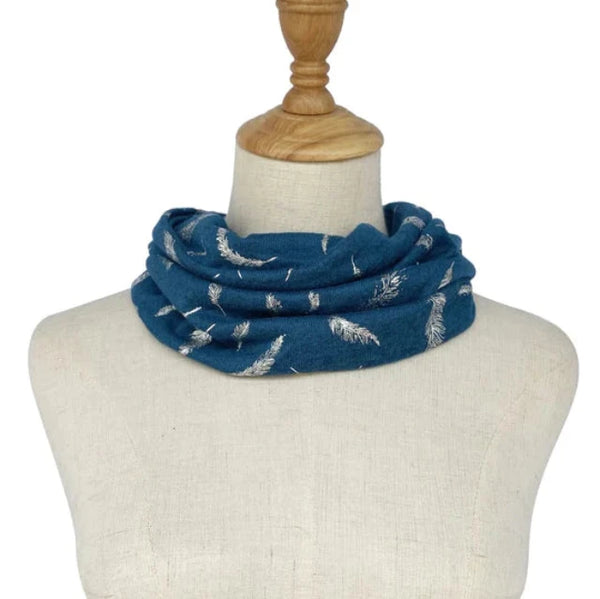 The Abella Snood Silver Feather Teal is a wonderfully cosy and shimmering eye catching snood