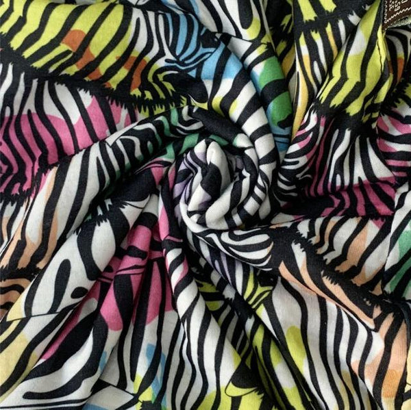 The Abella Snood Rainbow Zebras is a fabulously fun 'actual' zebra print that will add a gorgeous splash of colour to your outfit