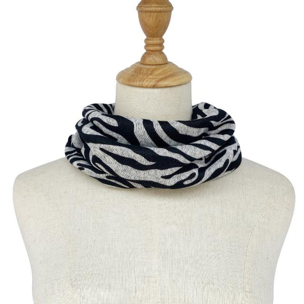 The Abella Snood Zebra Print Black and Grey is the perfect bold on trend print to add to your outfit to keep you cosy and warm 