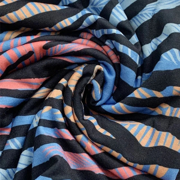 The Abella Snood Zebra Print Multicoloured is a gorgeous black zebra print with a fabulous rainbow of colours 