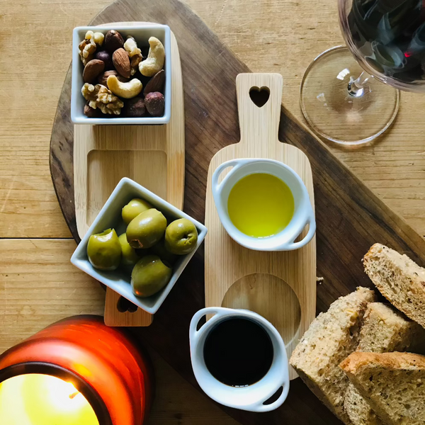 Useful little dipping bowls on a bamboo serving board, perfect for cosy nights in