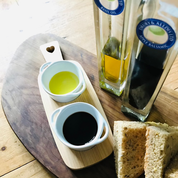 Useful little dipping bowls on a bamboo serving board, perfect for cosy nights in