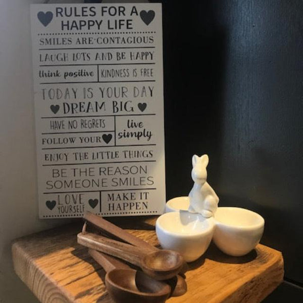 The Happy Life Sign is an uplifting list of rules for your cosy home