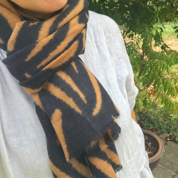 Gorgeous animal print scarf in black and tan zebra print in knot tie